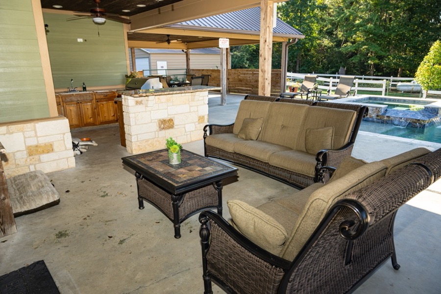 Inspira Ranch covered bar and pool area