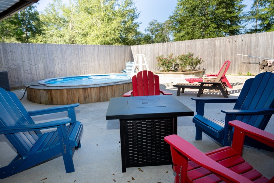 Inspira Ranch covered patio and fire pit — Livingston, TX event venue