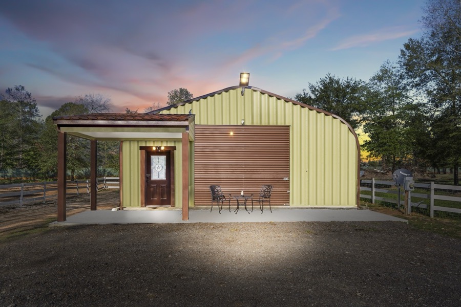 Inspira Ranch apartment exterior at dusk